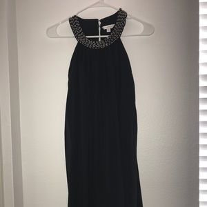 Black dress. Size M. Beaded neck. Charming Charlie